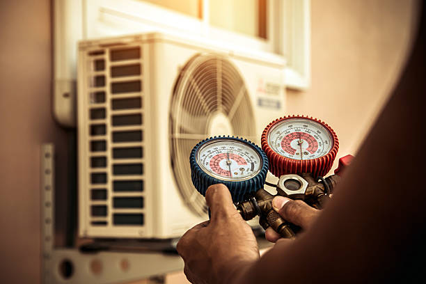 Professional Heat Pump Repair technician working in Paoli, OK